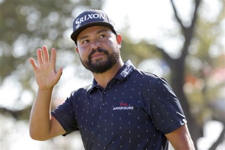 Who is J. J. Spaun's mother Dollie Spaun? 1 1649030159569