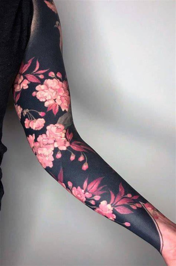 25 Beautiful Blackout Tattoos With White Ink On Top