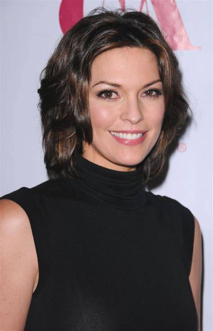 Actress Alana De La Garza and actor Linus Roache attend the 61st Annual