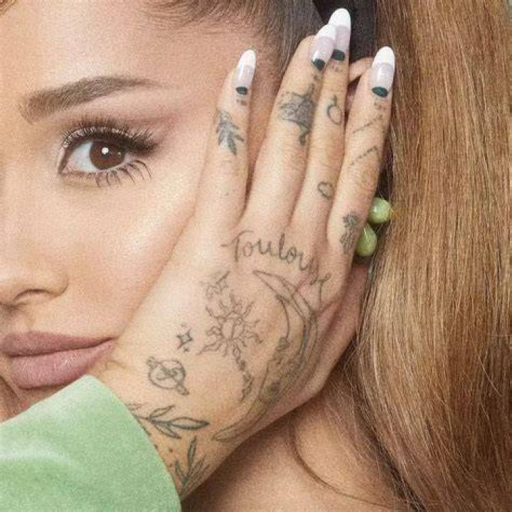 Ariana Grande's Hand Tattoo: Meaning, Symbolism, And Personal Significance Revealed