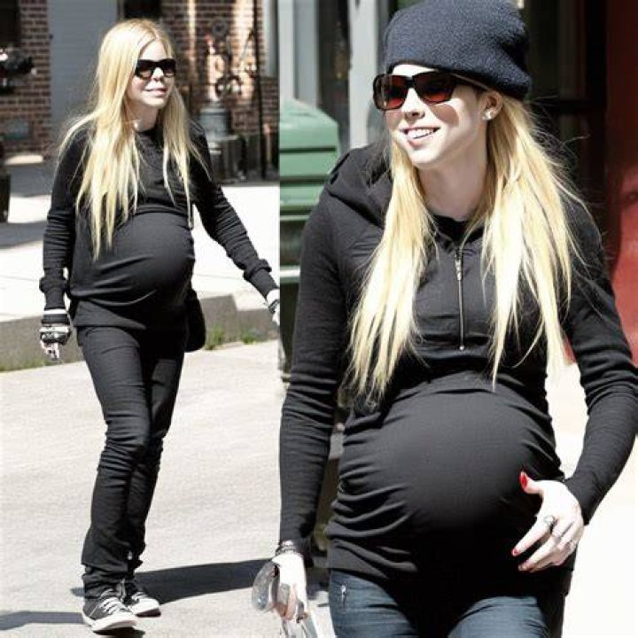 Avril Lavigne Pregnant? LooseFitting Snakeskin Dress Fuels Speculation
