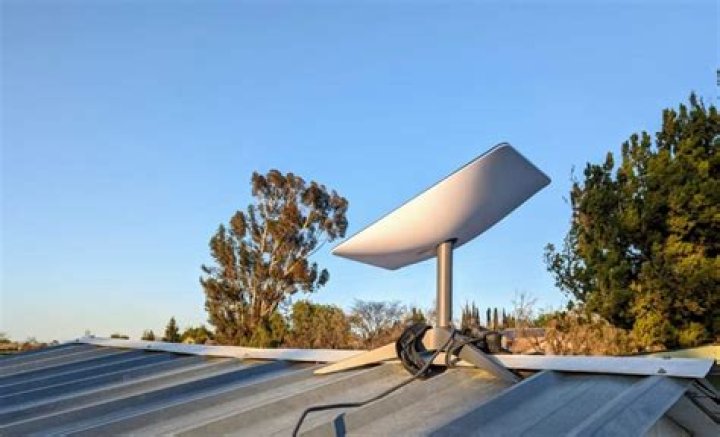 How do I set the antenna angle on my dish?