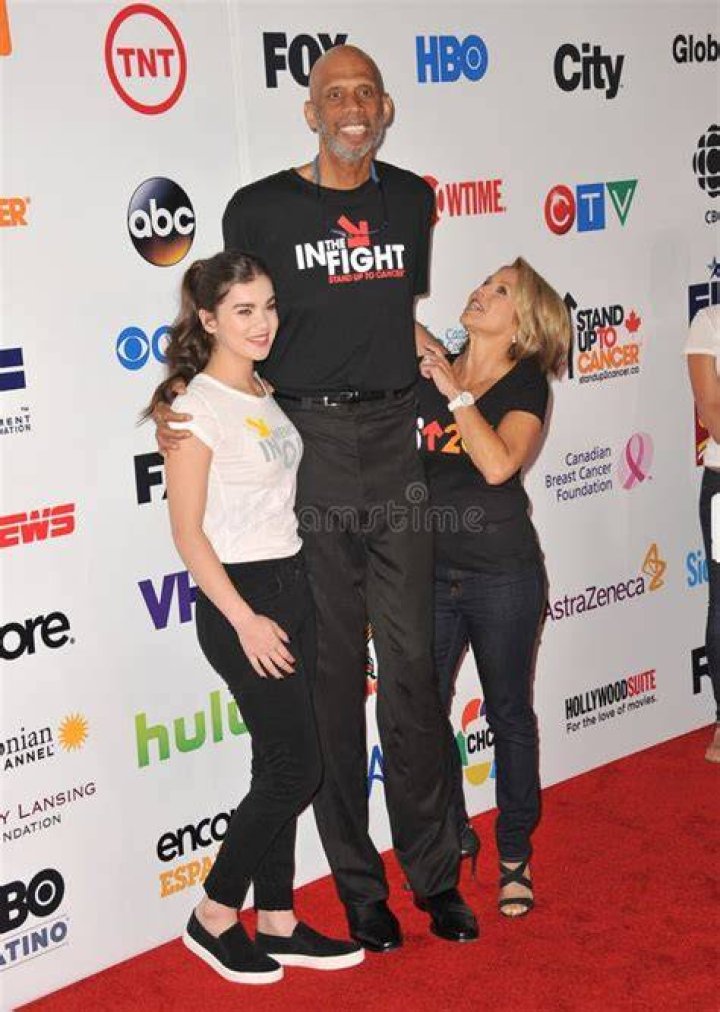Kareem AbdulJabbar towered over Katie Couric. Stars Set DC Aglow at
