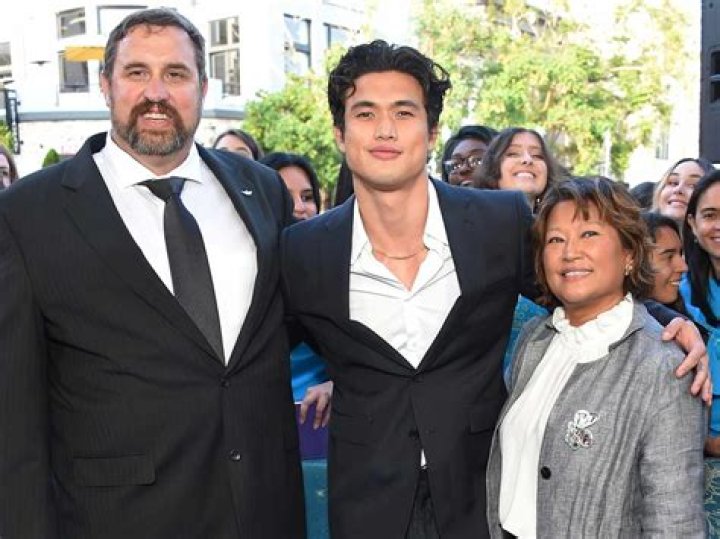 (LR) Dad Phil Melton, Charles Melton and Mom Sukyong Melton at "The