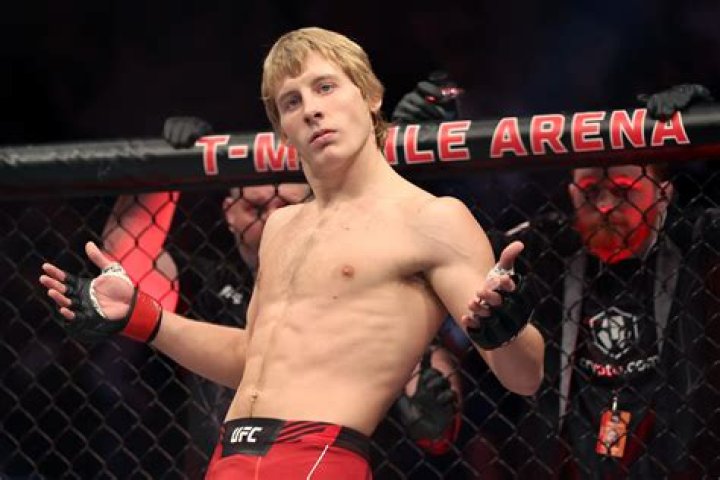 Paddy Pimblett's chic Looks like a geeky incel kid standing with his