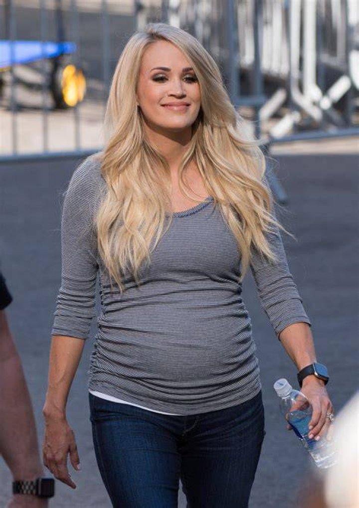 Pregnant CARRIE UNDERWOOD at American Music Awards in Los Angeles 10/09