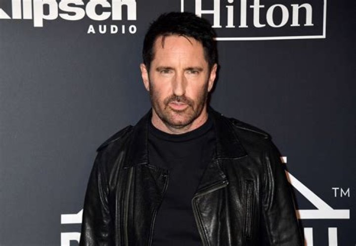 Trent Reznor shows his soft side as he dotes on his sons during family