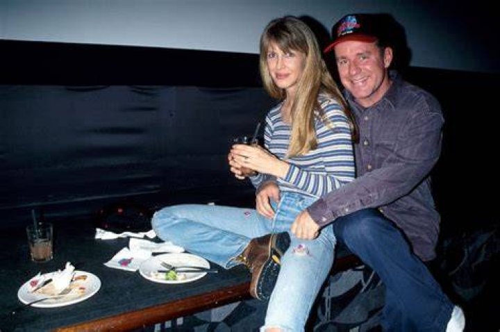 Who is Phil Hartman wife Lisa Strain? |