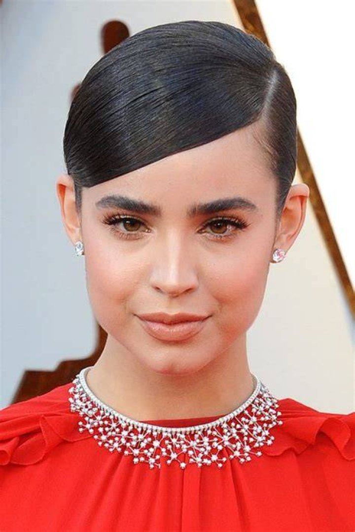Why is Sofia Carsons hair tucked in?