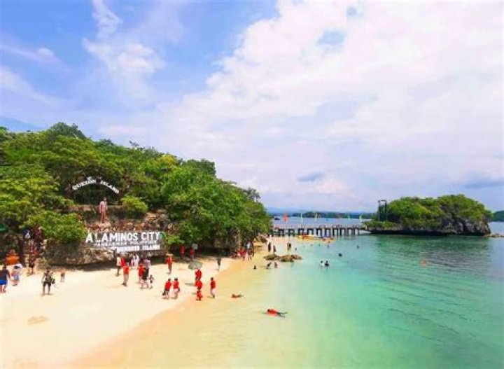 Why would you visit the hundred island in Alaminos City Pangasinan?